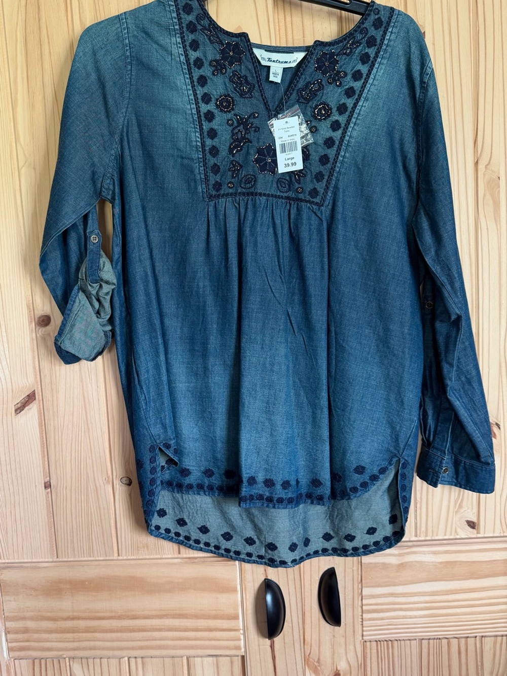 Tantrum chambray denim. Brand new. Size Large. Embroidery details